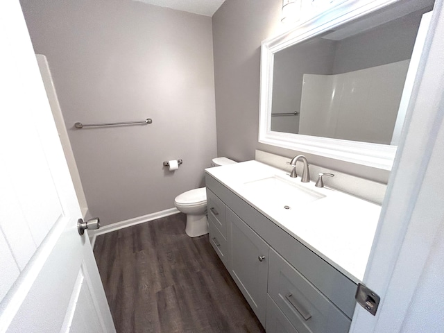 4594 Lee Dr NW, Cleveland, TN 37312 - bathroom with vanity, wood finished floors, and a shower