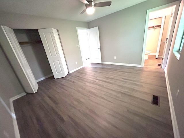 4594 Lee Dr NW, Cleveland, TN 37312 - unfurnished bedroom featuring dark wood finished floors, a closet, ensuite bath, and ceiling fan