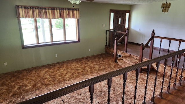 271 Anderson Rd, Palmer, TN 37365 - entryway featuring carpet, ceiling fan, and stairway