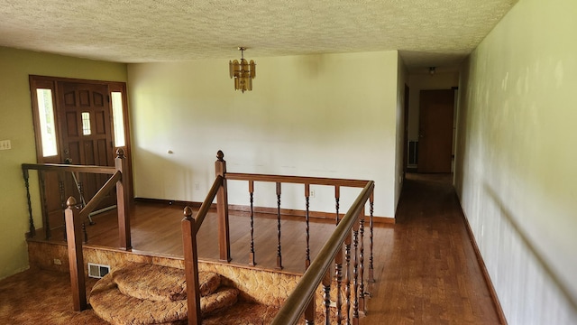 271 Anderson Rd, Palmer, TN 37365 - stairway featuring wood finished floors and a textured ceiling