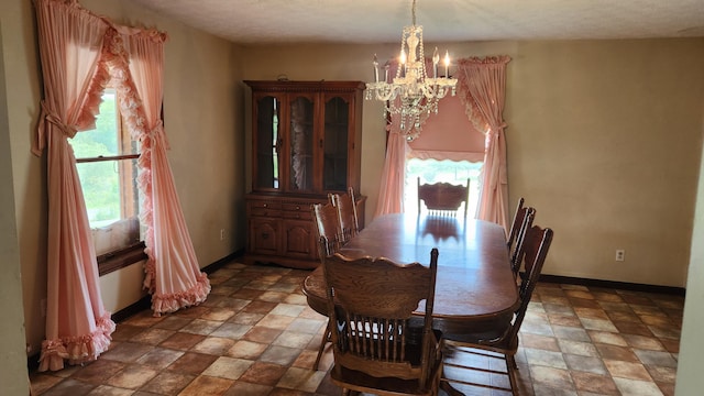 271 Anderson Rd, Palmer, TN 37365 - dining space with a chandelier and stone finish flooring