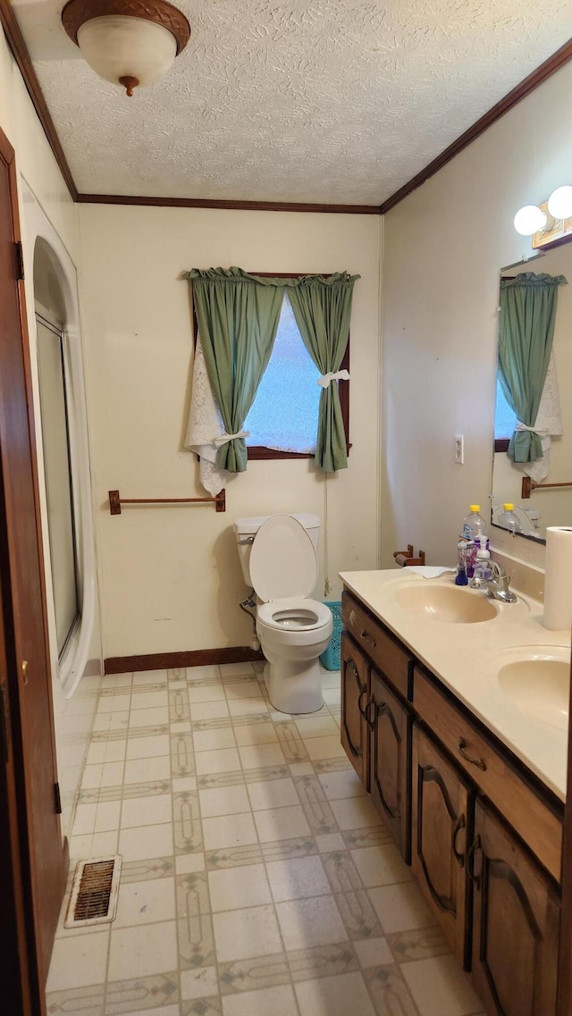 271 Anderson Rd, Palmer, TN 37365 - full bath featuring crown molding, a shower with door, a textured ceiling, tile patterned floors, and double vanity