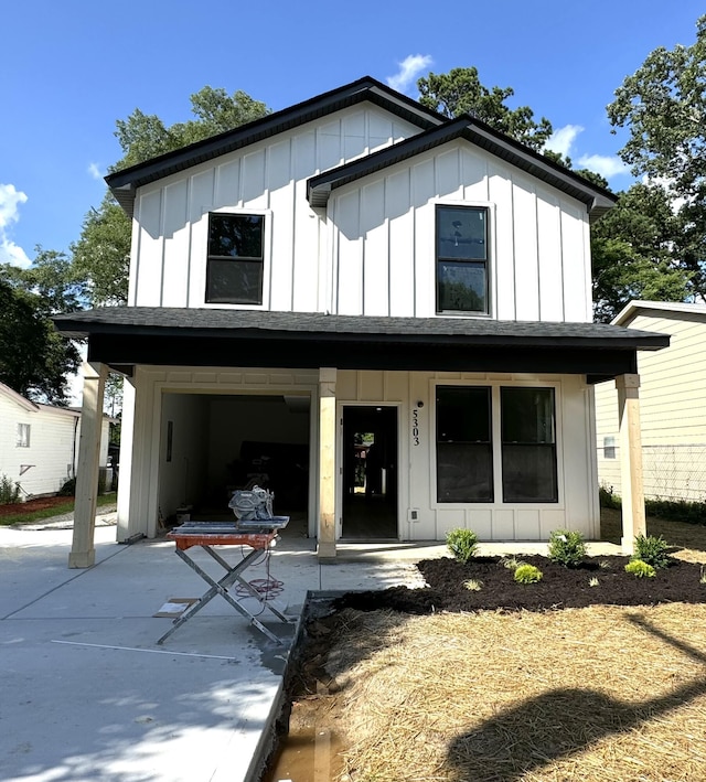 5303 Marion Ave, Chattanooga, TN 37412 - view of front of home with board and batten siding and driveway