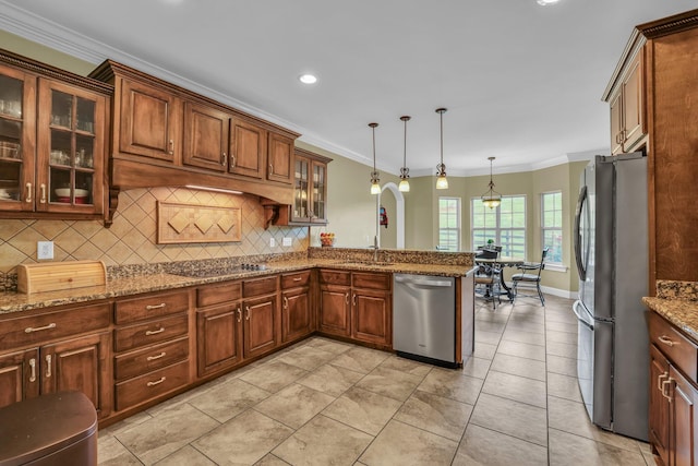 231 Turkey Run, Flintstone, GA 30725 - kitchen featuring appliances with stainless steel finishes, backsplash, a peninsula, crown molding, and decorative light fixtures