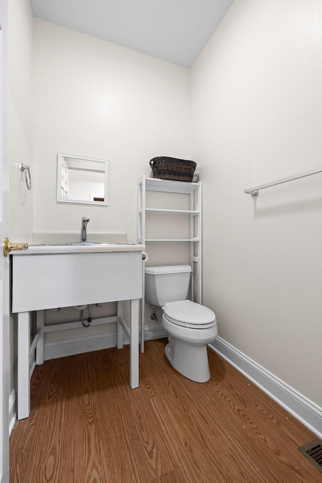 68 Bluff View Dr, Dunlap, TN 37327 - bathroom with toilet and wood finished floors