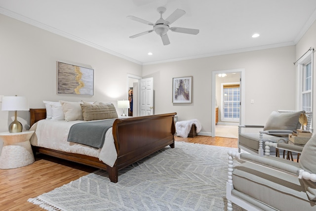 68 Bluff View Dr, Dunlap, TN 37327 - bedroom with light wood-style flooring, ornamental molding, recessed lighting, a walk in closet, and connected bathroom