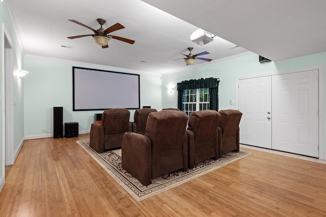 68 Bluff View Dr, Dunlap, TN 37327 - home theater room featuring a ceiling fan, ornamental molding, and light wood-style floors