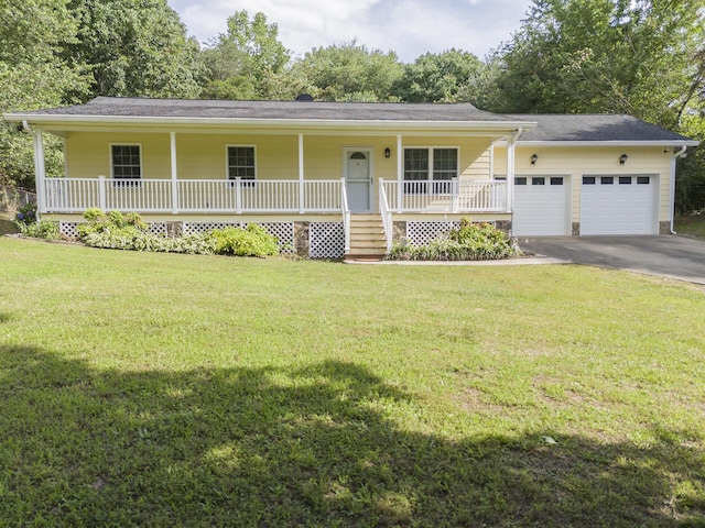 6632 Gamble Rd, Birchwood, TN 37308 - view of front of home featuring a porch, asphalt driveway, an attached garage, and a front yard