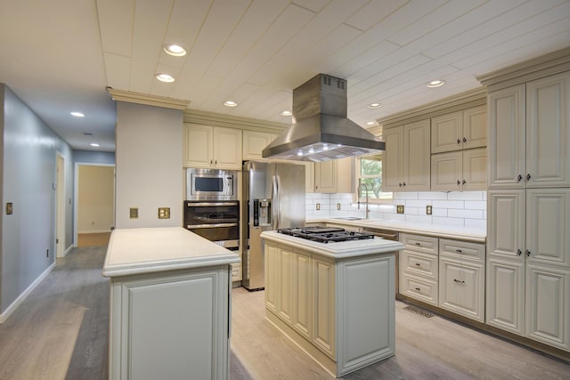 6632 Gamble Rd, Birchwood, TN 37308 - kitchen with island exhaust hood, a kitchen island, cream cabinetry, stainless steel appliances, and recessed lighting