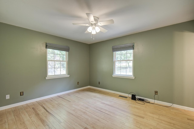 6632 Gamble Rd, Birchwood, TN 37308 - spare room featuring plenty of natural light, wood finished floors, and ceiling fan