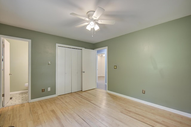 6632 Gamble Rd, Birchwood, TN 37308 - unfurnished bedroom featuring wood finished floors, a closet, connected bathroom, and ceiling fan
