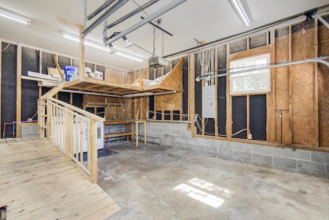 6632 Gamble Rd, Birchwood, TN 37308 - garage featuring a garage door opener