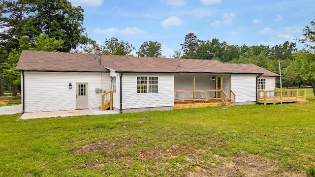 8208 Hixson Springs Rd, Signal Mountain, TN 37377 - rear view of house featuring a lawn and a wooden deck