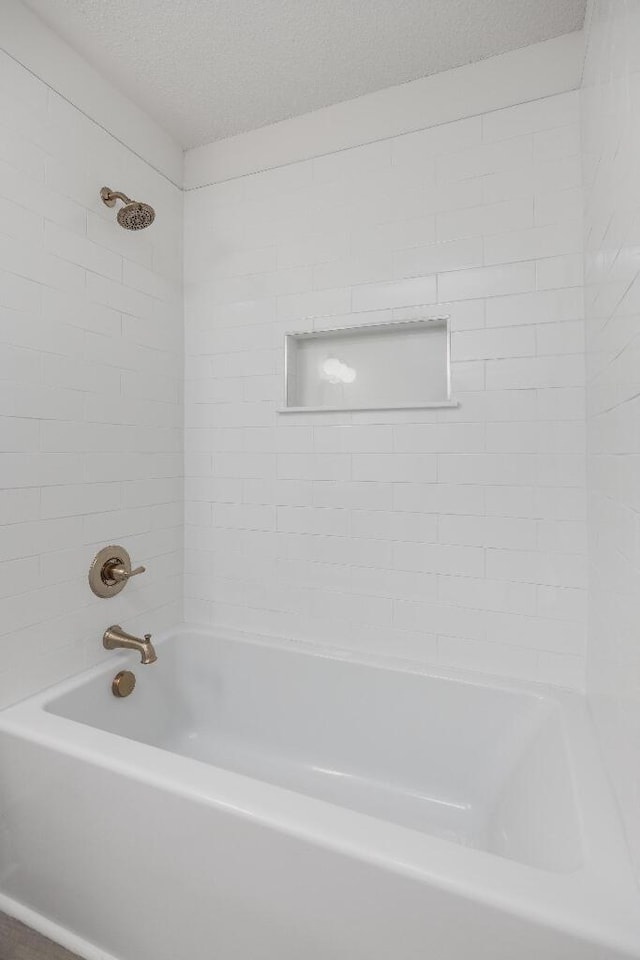 8208 Hixson Springs Rd, Signal Mountain, TN 37377 - bathroom featuring tub / shower combination and a textured ceiling