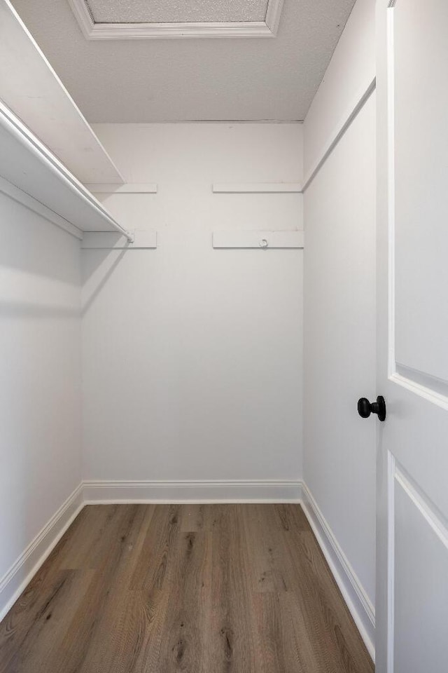 8208 Hixson Springs Rd, Signal Mountain, TN 37377 - walk in closet featuring wood finished floors