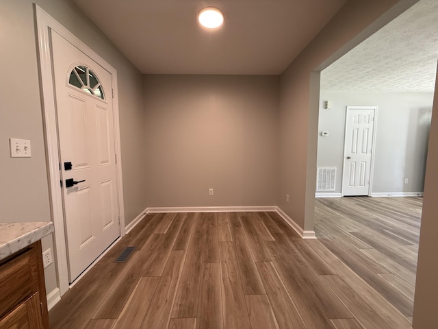9424 Fuller Rd, Chattanooga, TN 37421 - entrance foyer featuring dark wood-style floors and baseboards