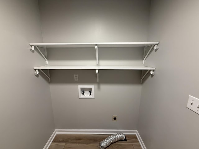 9424 Fuller Rd, Chattanooga, TN 37421 - laundry room with electric dryer hookup, hookup for a washing machine, and dark wood-style flooring