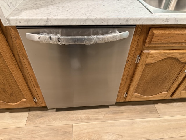 9424 Fuller Rd, Chattanooga, TN 37421 - kitchen view of brown cabinetry and dishwasher