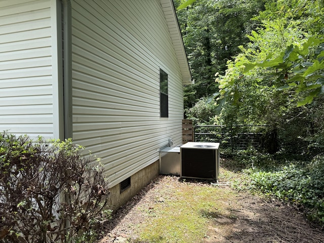 9424 Fuller Rd, Chattanooga, TN 37421 - view of side of home featuring a central air condition unit and crawl space