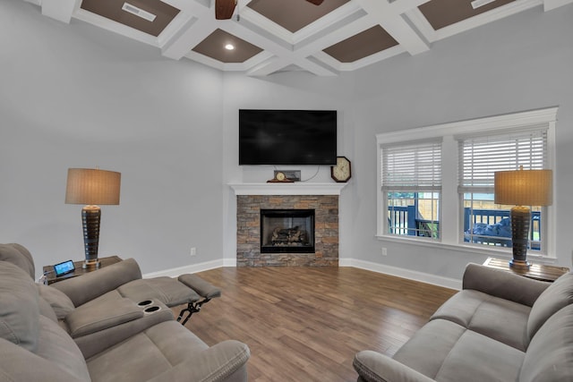 386 Twelve Oaks Dr, Rock Spring, GA 30739 - living area featuring coffered ceiling, a towering ceiling, ceiling fan, beam ceiling, and wood finished floors