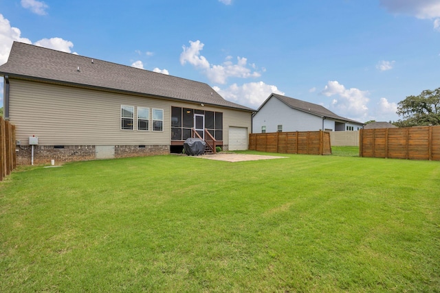 386 Twelve Oaks Dr, Rock Spring, GA 30739 - rear view of property with a fenced backyard, a sunroom, crawl space, a garage, and roof with shingles