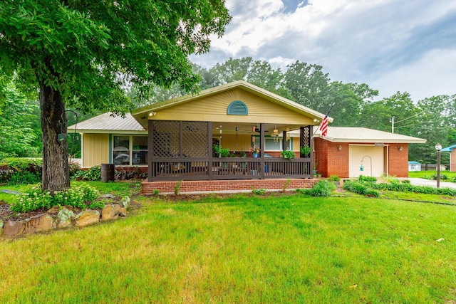 1027 Crestridge Dr, Rossville, GA 30741 - ranch-style home with a front lawn, an attached garage, brick siding, and concrete driveway