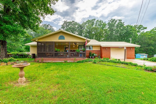 1027 Crestridge Dr, Rossville, GA 30741 - ranch-style home with an attached garage, a front lawn, a porch, driveway, and ceiling fan