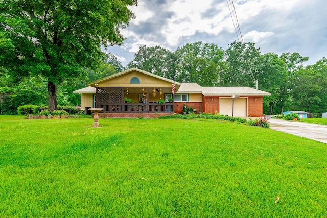 1027 Crestridge Dr, Rossville, GA 30741 - single story home featuring a front lawn, a ceiling fan, driveway, an attached garage, and a porch