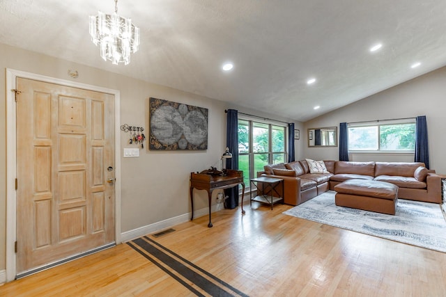 1027 Crestridge Dr, Rossville, GA 30741 - living area featuring light wood-style flooring, healthy amount of natural light, recessed lighting, a chandelier, and lofted ceiling