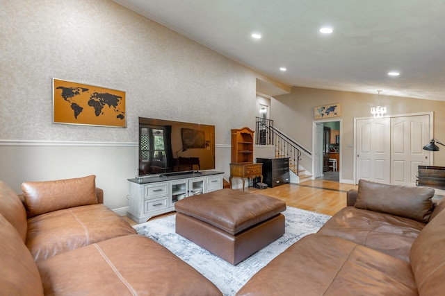 1027 Crestridge Dr, Rossville, GA 30741 - living room with vaulted ceiling, stairway, wood finished floors, and recessed lighting