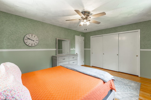 1027 Crestridge Dr, Rossville, GA 30741 - bedroom featuring wood finished floors, a closet, and a ceiling fan