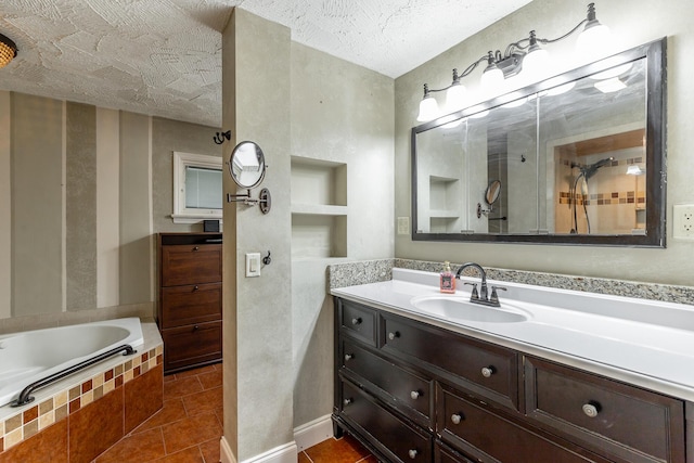 1027 Crestridge Dr, Rossville, GA 30741 - bathroom with vanity, a bath, tile patterned floors, and a textured ceiling