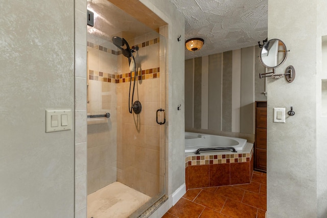 1027 Crestridge Dr, Rossville, GA 30741 - bathroom with a stall shower, tile patterned flooring, and a garden tub