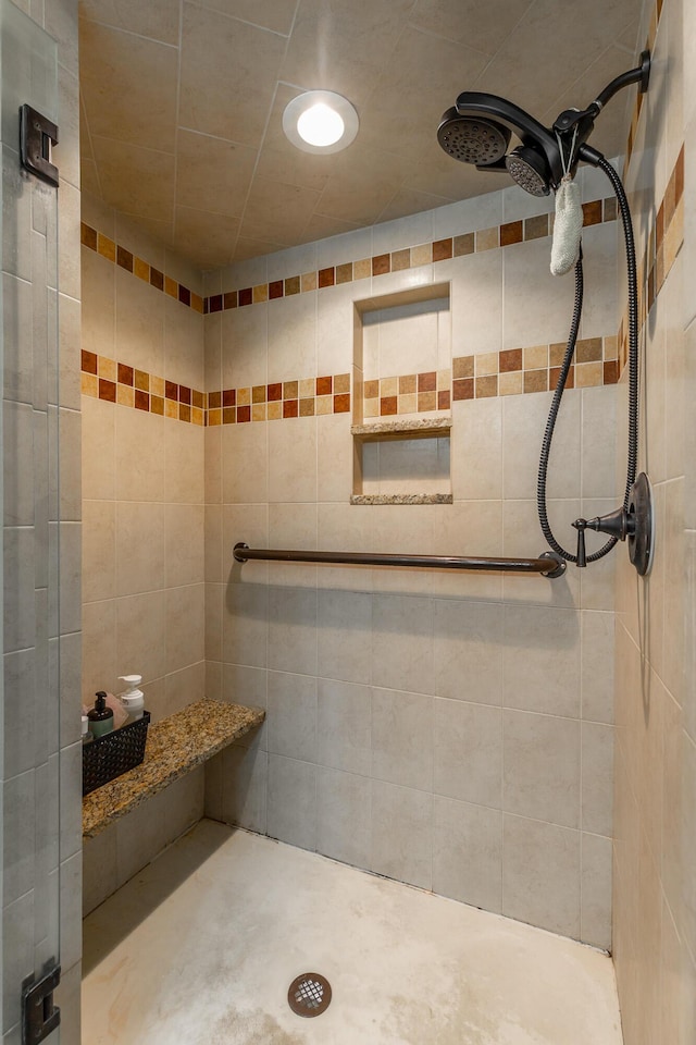1027 Crestridge Dr, Rossville, GA 30741 - bathroom featuring a tile shower