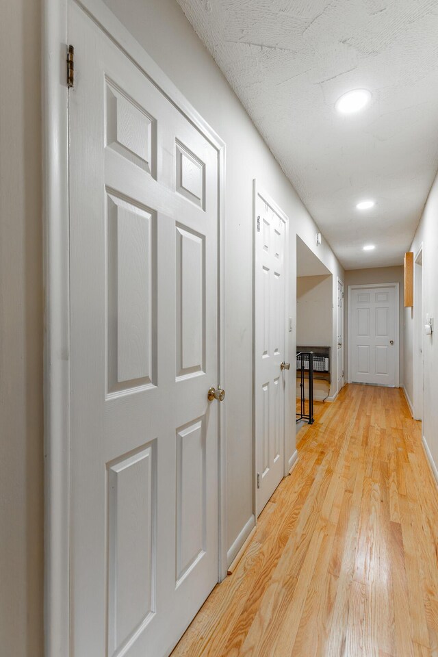1027 Crestridge Dr, Rossville, GA 30741 - corridor with light wood-style flooring and recessed lighting
