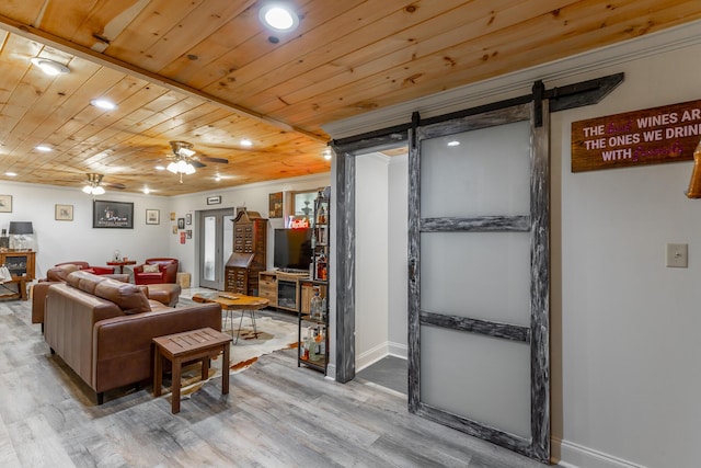 1027 Crestridge Dr, Rossville, GA 30741 - living room featuring a barn door, wood finished floors, ceiling fan, recessed lighting, and wood ceiling