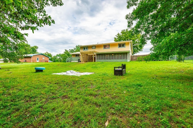 1027 Crestridge Dr, Rossville, GA 30741 - back of property with a sunroom