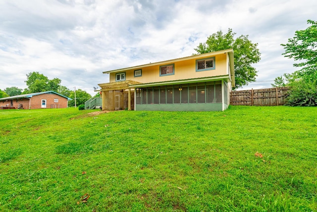1027 Crestridge Dr, Rossville, GA 30741 - back of property with a sunroom