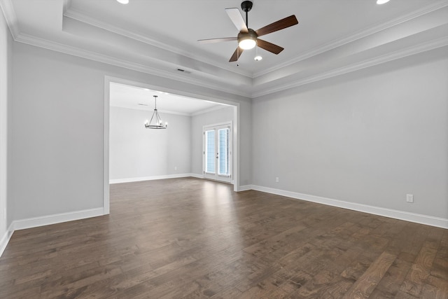 3480 Travertine Ln, Chattanooga, TN 37405 - empty room with a chandelier, dark wood-style flooring, a ceiling fan, ornamental molding, and a raised ceiling