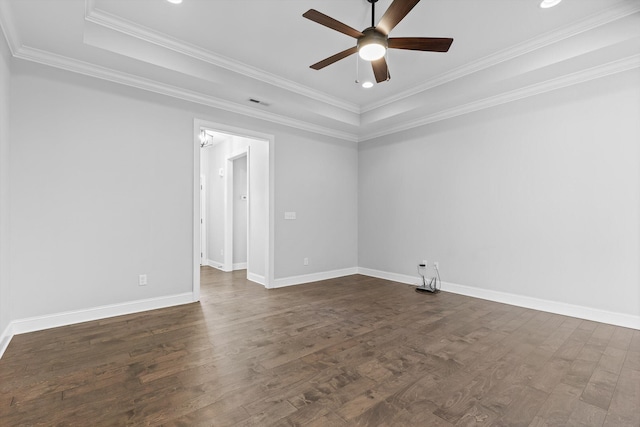 3480 Travertine Ln, Chattanooga, TN 37405 - unfurnished room with ceiling fan, dark wood-style floors, a tray ceiling, and ornamental molding
