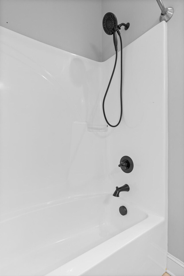 3480 Travertine Ln, Chattanooga, TN 37405 - bathroom featuring shower / tub combination and baseboards