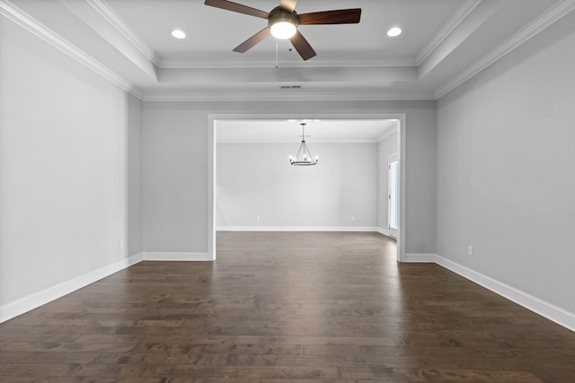 3480 Travertine Ln, Chattanooga, TN 37405 - empty room featuring a chandelier, dark wood finished floors, a raised ceiling, ceiling fan, and crown molding