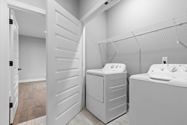 3480 Travertine Ln, Chattanooga, TN 37405 - laundry area featuring independent washer and dryer and light wood finished floors