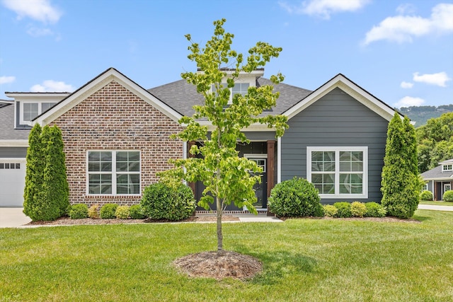 3480 Travertine Ln, Chattanooga, TN 37405 - view of front of house featuring brick siding, a front lawn, a shingled roof, and an attached garage