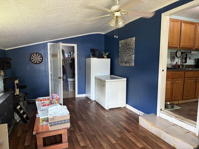 78 Mcdonough St, Dunlap, TN 37327 - living area with ceiling fan, dark wood-style floors, ornamental molding, and vaulted ceiling