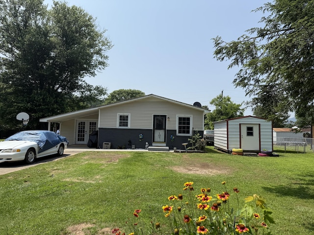 78 Mcdonough St, Dunlap, TN 37327 - view of front facade with a storage unit, entry steps, and french doors