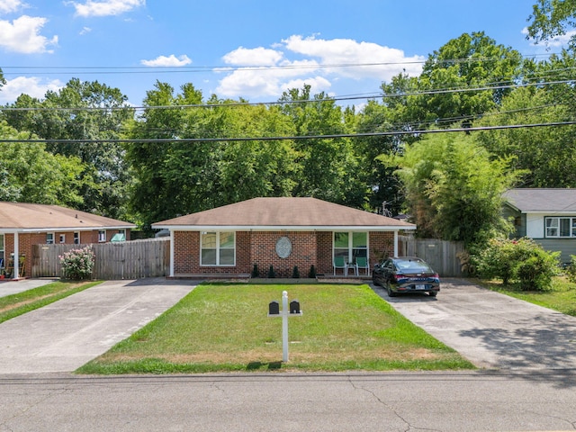 ranch-style home with concrete driveway and brick siding
