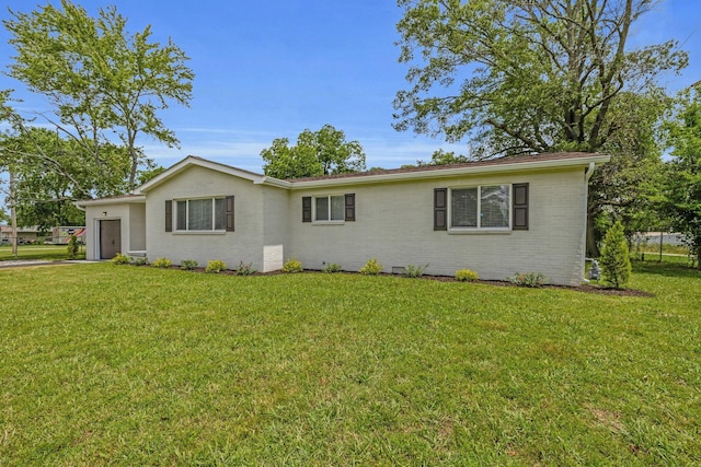 185 Block Rd, Rossville, GA 30741 - view of front of home featuring a front yard and brick siding