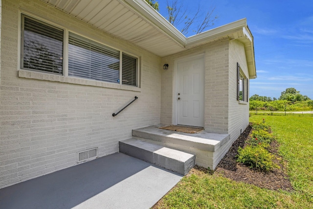 185 Block Rd, Rossville, GA 30741 - doorway to property featuring brick siding and a patio
