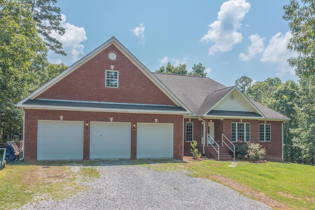 1103 Monroe Green Rd, Trion, GA 30753 - view of front of home featuring a front yard, brick siding, covered porch, and driveway